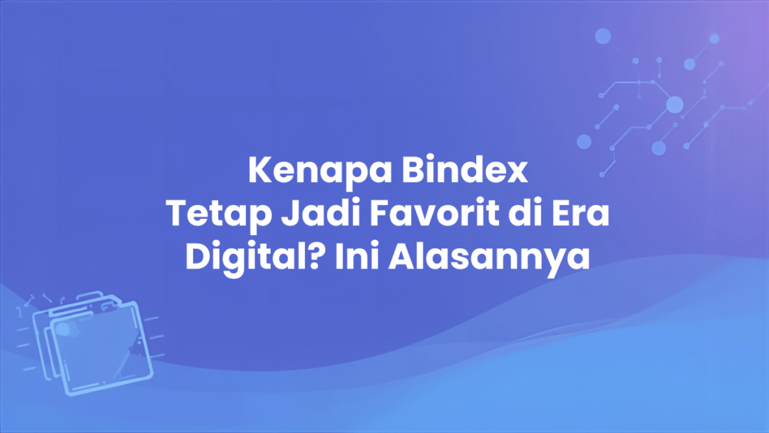 Bindex di atas meja kerja modern dengan laptop menunjukkan kolaborasi dokumen fisik dan digital