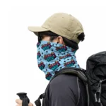 Pria Memakai Masker Buff Motif Good Day dengan Tas Carrier